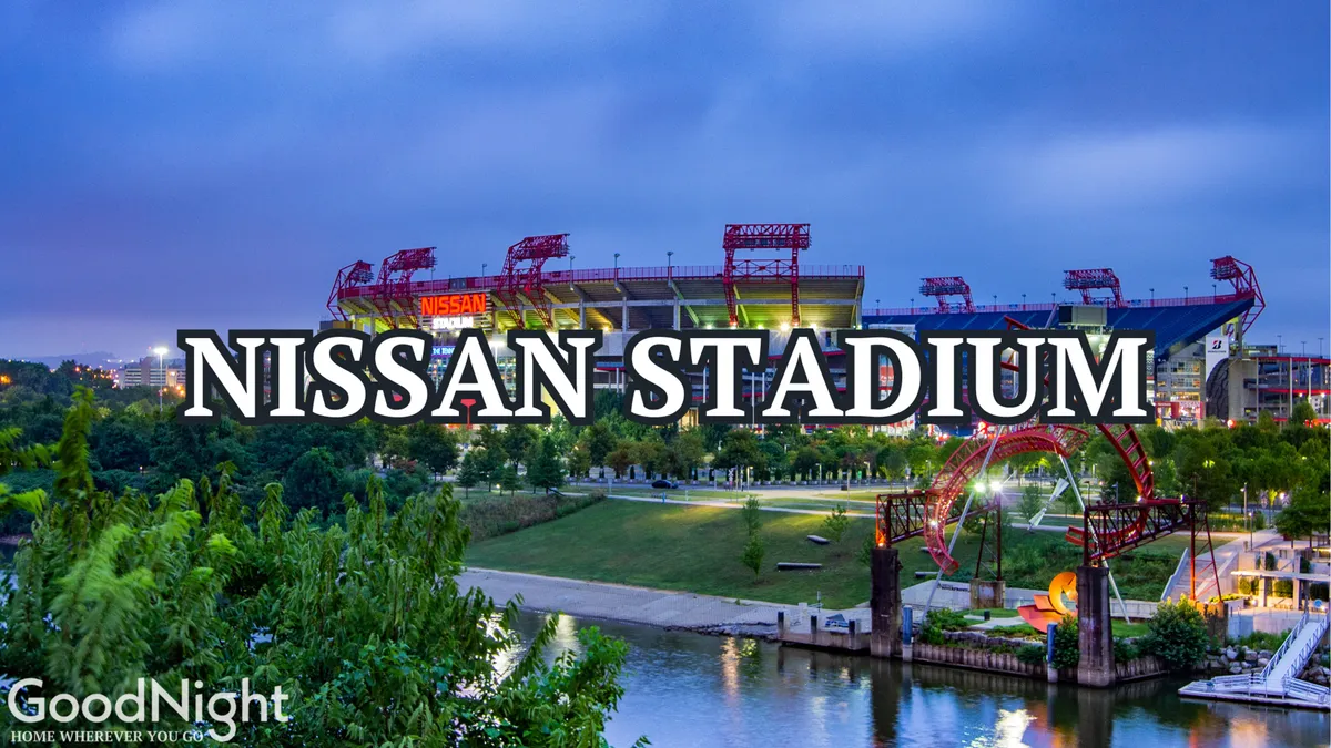 Nissan Stadium, set beside the riverfront park and city skyline, is shown with its recognizable structure and sweeping views. The pedestrian bridge hints at easy access to sports events, concerts, and scenic walks.