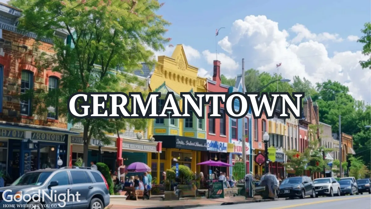 A vibrant streetscape featuring colorful storefronts, outdoor seating with umbrellas, and people strolling and dining. The lively mood and inviting setting showcase community life, offering a sense of the local dining and social atmosphere families can enjoy nearby.